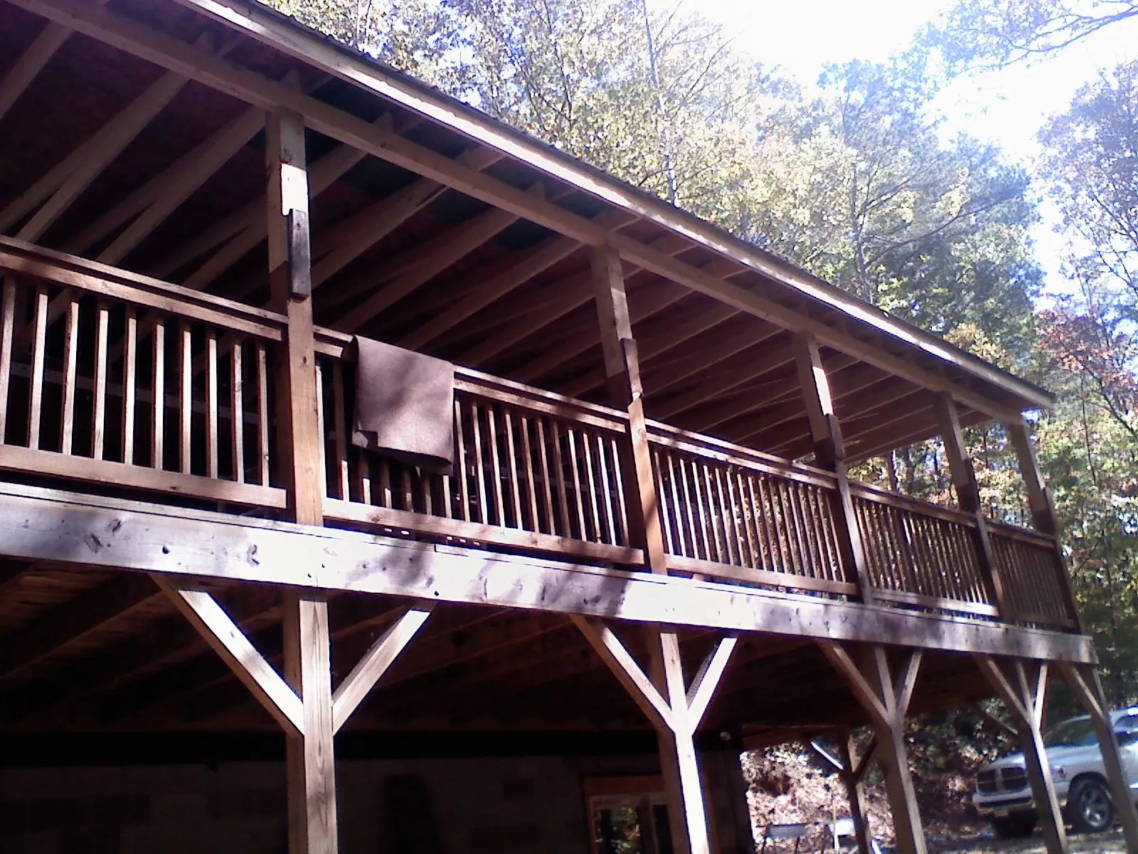 Timber framing under a new elevated porch and deck — Roof Leak Repair in Wauseon by Roofing Brothers